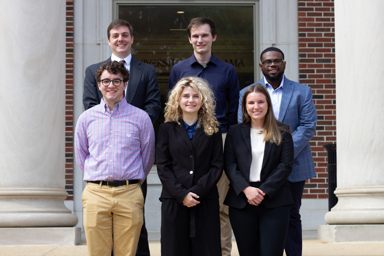 OIC interns posing on the front steps of Rose