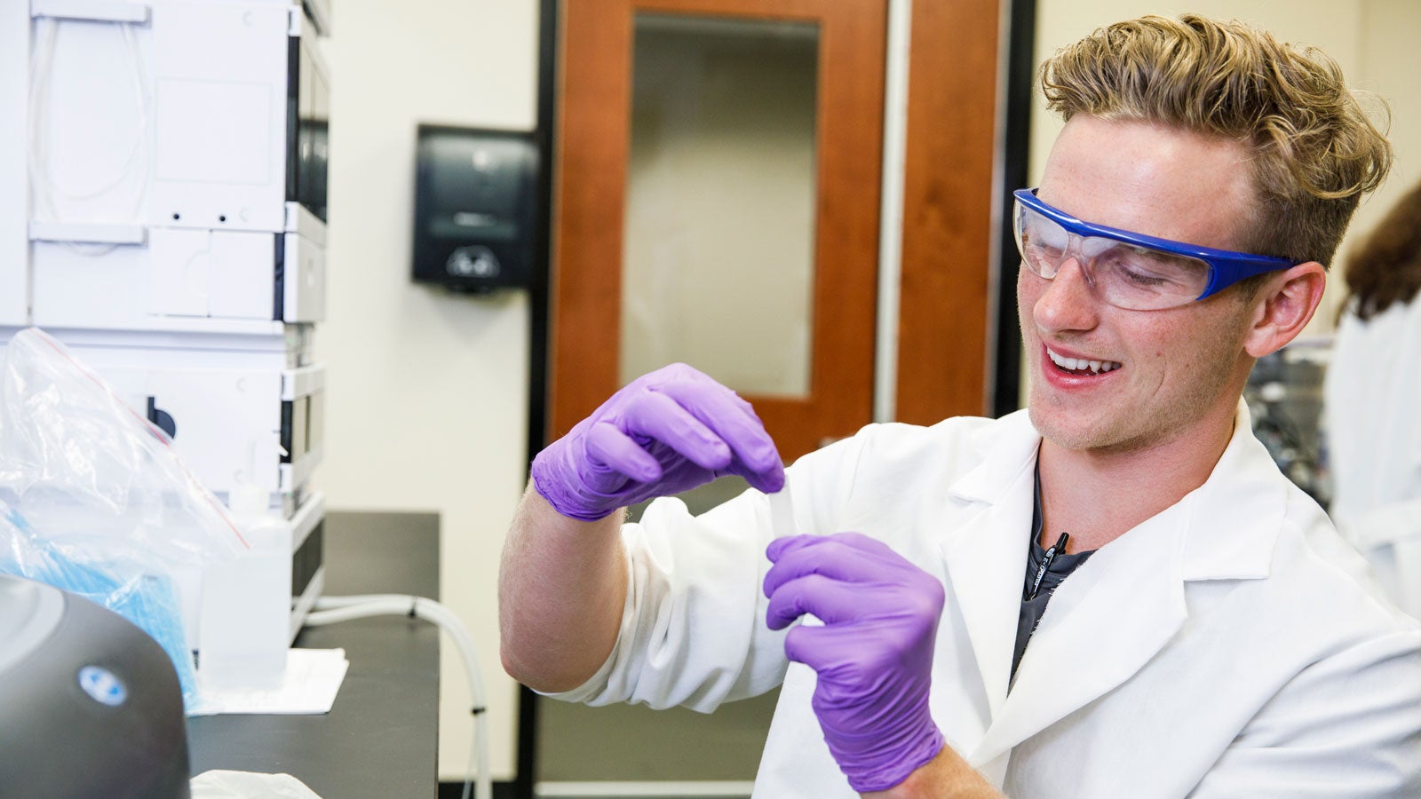 student researcher in a lab