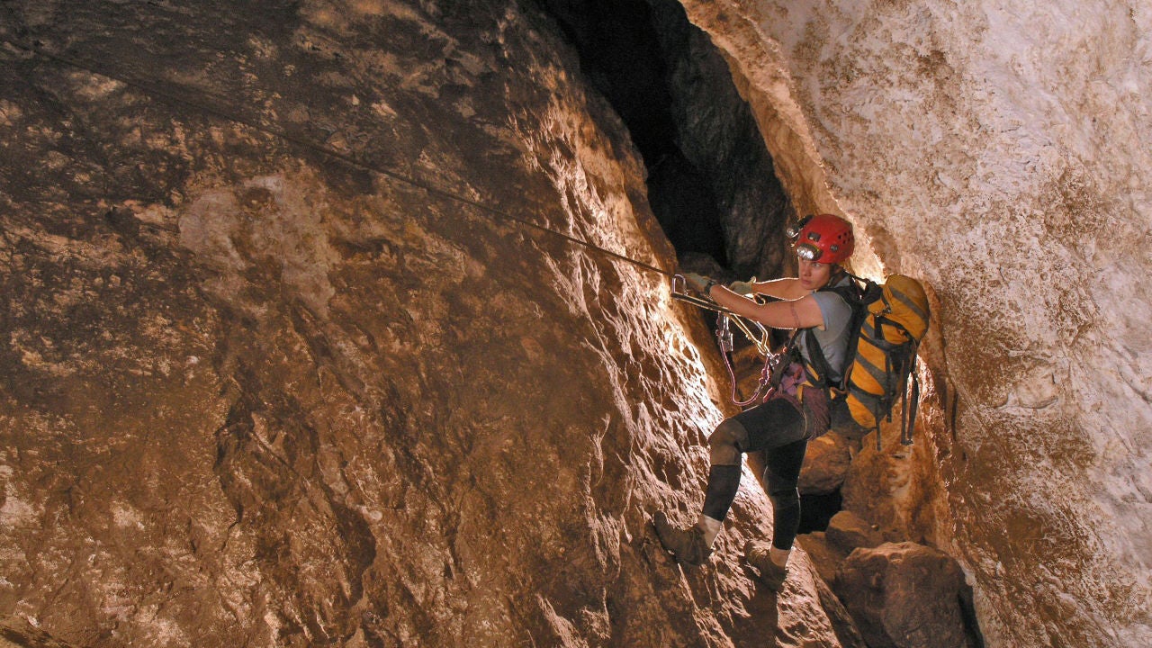 Hazel Barton traversing the Rift Passage during a camp trip in Lechuguilla Cave, New Mexico. Photo credit: Dave Bunnell